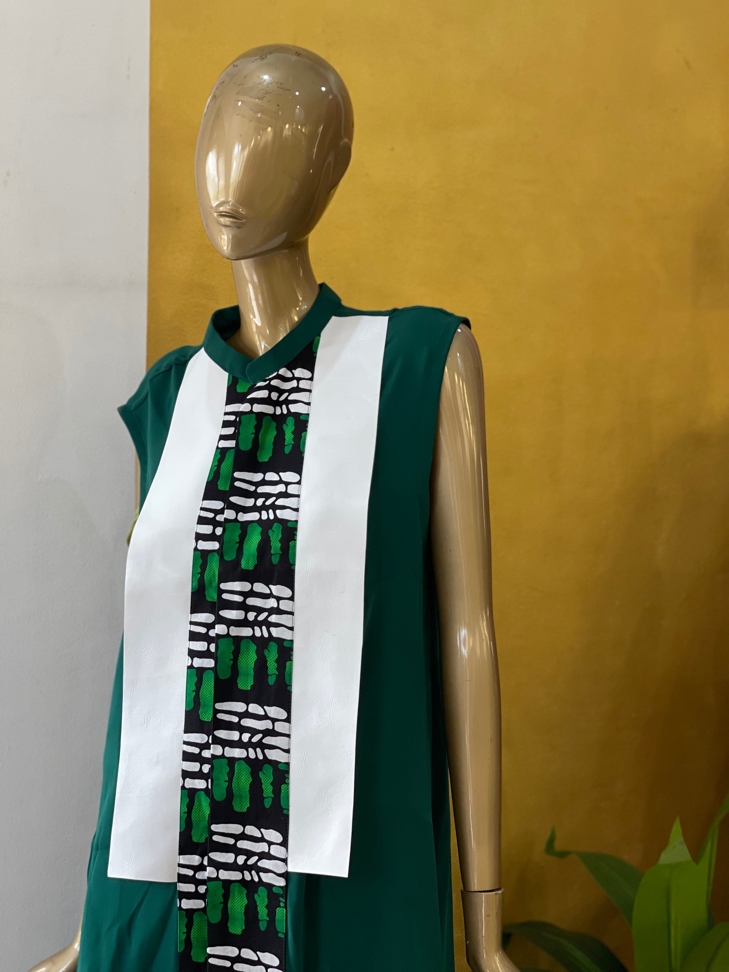 Green tunic with black leather and print panel