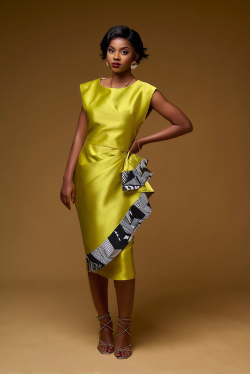 tailored sheath dress with draped skirts and african print trim